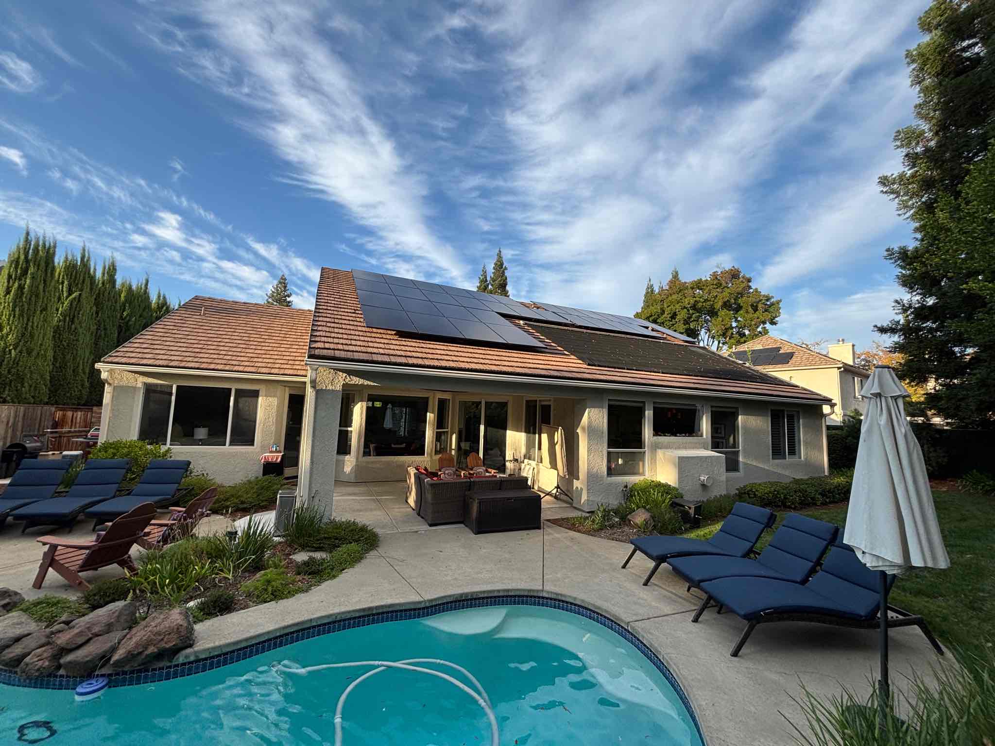 Home with rooftop solar panels installed